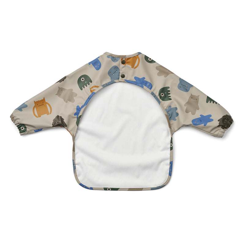 Liewood Kinder Latz mit Ärmeln Merle Monsters blue mix bei Yay Kids