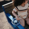 Mushie Spinner Spielzeug mit Saugnapf Rad Blau bei Yay Kids