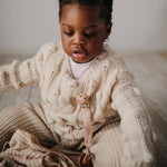 Mushie Schnullerkette aus Stoff in Rosa bei Yay Kids
